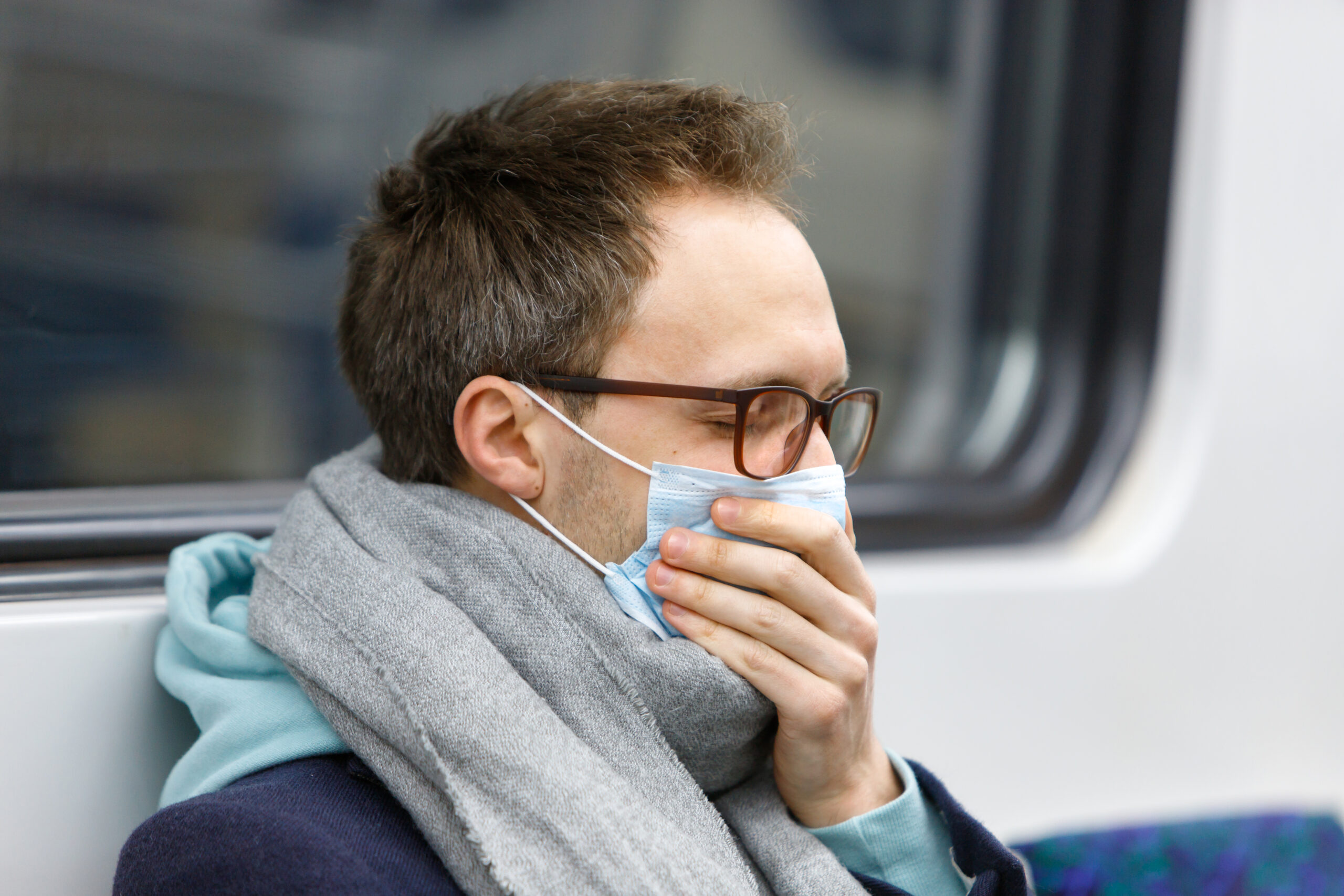 sick man wear face protective mask in subway train 2021 08 31 12 59 07 utc scaled